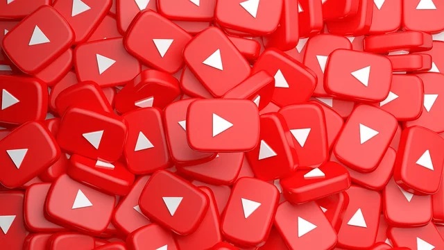 a lot of small red youtube play button blocks piled up together